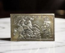 A commemorative silver 10 shilling stamp, London 2001, 21.