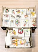 A quantity of Disney themed Christmas baubles with boxes.