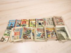 A collection of vintage annuals including The Wizard, The Brunes, Oor Woolie, etc.
