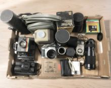 A Fujifilm Finepix S304 camera, a Polaroid Instant 20 camera, various lenses, pair of binoculars,