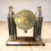 A WW I trench art mantel clock, height 36 cm.