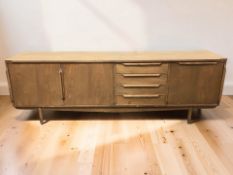 A 20th century teak low sideboard, 222 cm x 46 cm x 76 cm.