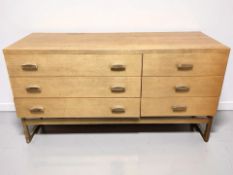A 20th century teak six drawer chest, 131 cm x 48 cm x 73 cm.