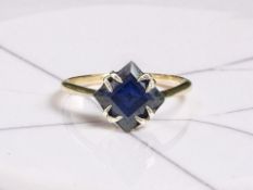 A 9ct gold synthetic sapphire solitaire ring, size M CONDITION REPORT: 1.
