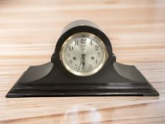 An early 20th century Ansonia eight day mantel clock with silvered dial, height 26 cm.