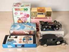 A group of vintage radios including a John Player Special radio,