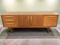 A 1960's Stonehill teak low sideboard fitted cupboards and drawers, 182 cm x 42 cm x 72 cm.