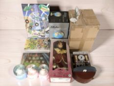 A group of snow globes, Leonardo collection doll, globe touch lamp, wall clock, etc.