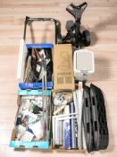 Miscellaneous items including a golf bag, caddy, craft items, posters, rolls of wrapping paper,