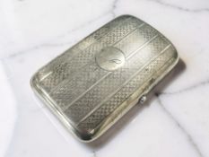 An Edward VII heavy-gauge silver cigarette case, Birmingham 1903,