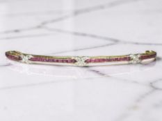 A gold ruby and diamond hair clip/slide, possibly French, length 9cm.