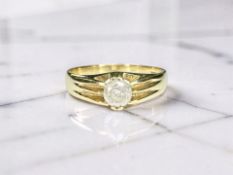 An 18ct gold diamond solitaire ring, the brilliant-cut stone weighing an estimated 0.