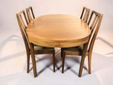 A Nathan teak oval extending dining table with internal leaf, unextended 153 cm x 100 cm x 76 cm,