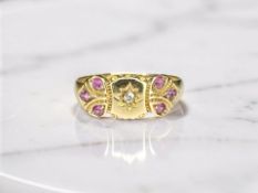 A Victorian 18ct gold diamond and ruby ring, size L CONDITION REPORT: 2.