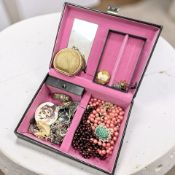 A musical jewellery box of assorted costume items