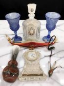 A Waterford Crystal mantel timepiece, a pair of Fostoria blue glass goblets,