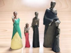 Four African resin figures, tallest 52 cm.