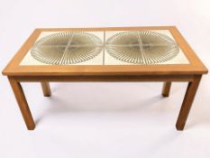 A 20th century teak and tile inset rectangular coffee table, length 92 cm.