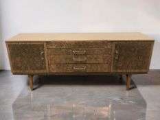 A 20th century high gloss low sideboard, 184 cm x 47 cm x 77 cm.