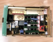 A collection of boxed costume jewellery including various pendants, pairs of earrings,