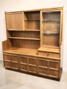 A Nathan teak cocktail sideboard, 137 cm x 45 cm x 145 cm.
