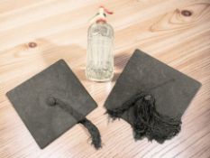 Two large wooden mallets, enameled brass dishes, painted wooden coat rack,
