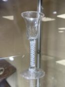 A Georgian wine glass, circa 1750, the bell-shaped bowl above an opaque air twist stem, height 16.