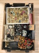 Assorted costume jewellery including various brooches and earrings, bead necklaces, etc.