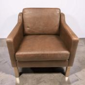 A late 20th century Scandinavian brown leather armchair, width 72 cm.