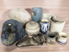 A collection of studio pottery vases, face mask wall pocket / planter, etc.