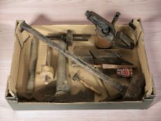 A group of vintage hand tools, blow torch, etc.
