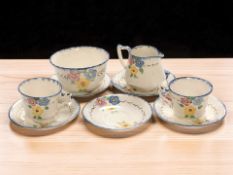 Nine pieces of James Kent floral decorated tea china.