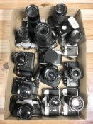 A collection of film and digital cameras including three Zenit E cameras, Zenit B, Zenit 11,