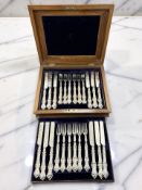 A Victorian silver-handled twelve-plate setting dessert cutlery service, Sheffield marks,