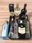 Eight modern bottles of alcohol including Bombay Sapphire gin, Ballantine's Blended Scotch whisky,