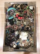 A large quantity of costume bead necklaces, bangles, etc.