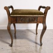 An Edwardian stained beech piano stool, width 56 cm.