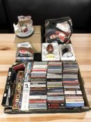 A group of Elvis Presley collectibles and ornaments, assorted CDs including Elvis and other artists.