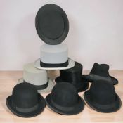 A gent's black silk top hat retailed by Lock & Co, St James Street, London,