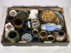 A collection of 20th century pottery wares including jugs, bowls, mugs, etc.