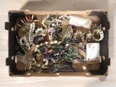 A collection of costume bead necklaces, gold plated chains, bangles, etc.