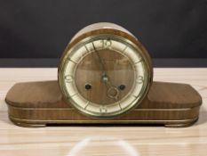 A walnut cased Art Deco mantel clock signed 'Gloriosa', width 38 cm.