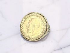 A 9ct gold signet ring set with a 1912 half sovereign, size V CONDITION REPORT: 7.