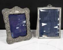 Two Edwardian silver-mounted easel photograph frames, tallest 20cm.