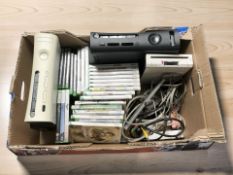 Two Xbox 360 consoles, a Nintendo Wii and various games.
