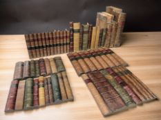 A collection of decorative faux book spines, tallest 26 cm.