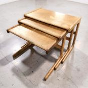 A teak nest of three tables stamped 'Made in Denmark Salin 5800 Nyborg', width 61 cm.