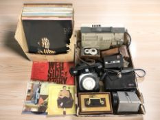A bakelite telephone, various cameras including Kodak, Halina, vintage cash tin,