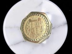 A 9ct gold signet ring set with an 1861 shield back full sovereign,
