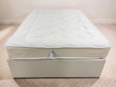 A 4ft 6 divan base and mattress.